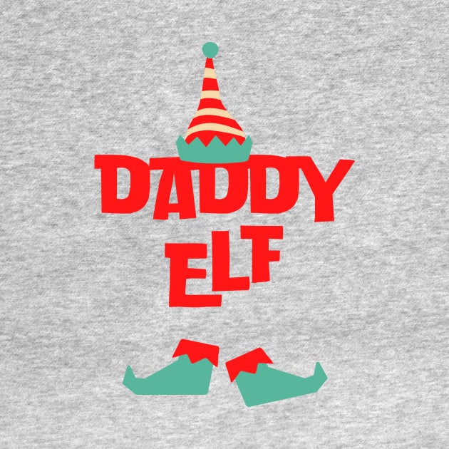 Daddy elf by the christmas shop